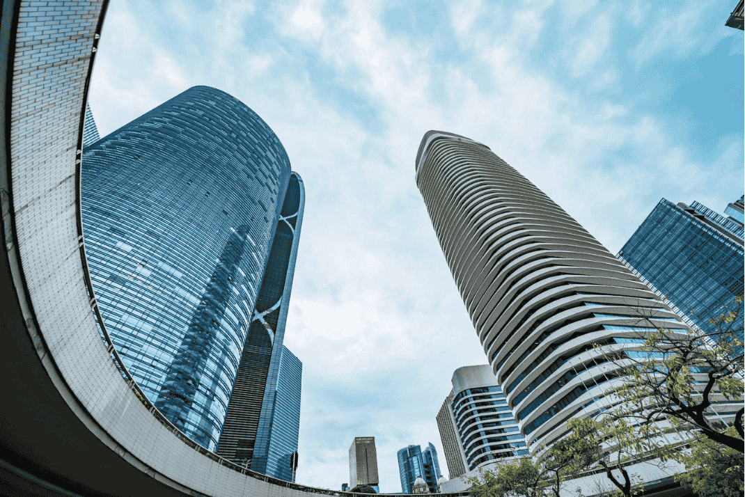 corporate buildings with a cloudy sky